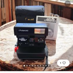 Brand new Polaroid 600 business addition 2 camera with case