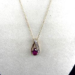 2gm 10k Yellow Gold SMALL CIRCLE LINK CHAIN WITH RED CLEAR STONE.