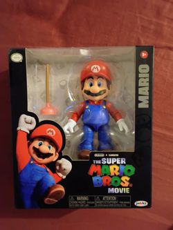 MARIO figurine and accessory from THE SUPER MARIO BROS. MOVIE