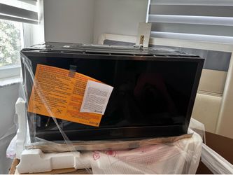 Black stainless LG microwave