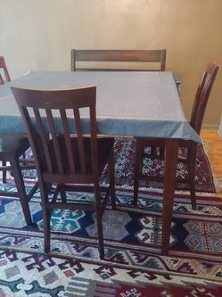 Table with 6 chair and a branch