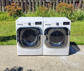 LG MEGA CAPACITY WASHER AND DRYER SET.