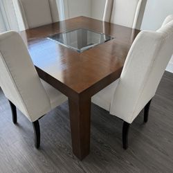 4 top dining table and chairs- perfect size for condo or apartment
