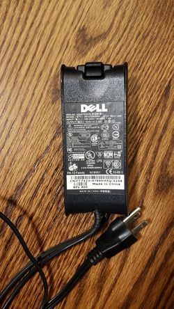 Dell laptop computer power supply 100- 220 v