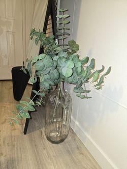 Glass vase with faux eucalyptus