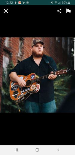 Looking for 4 Luke Combs tickets