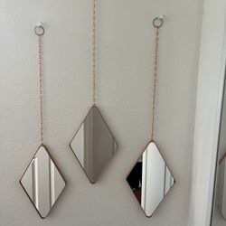 Umbra Dima mirrors instead of three Dima brass decorative wall mirrors