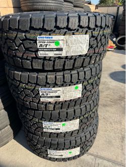 33x12.50r17 Toyo At tires nuevas con 70,000 millas de garantía las 4