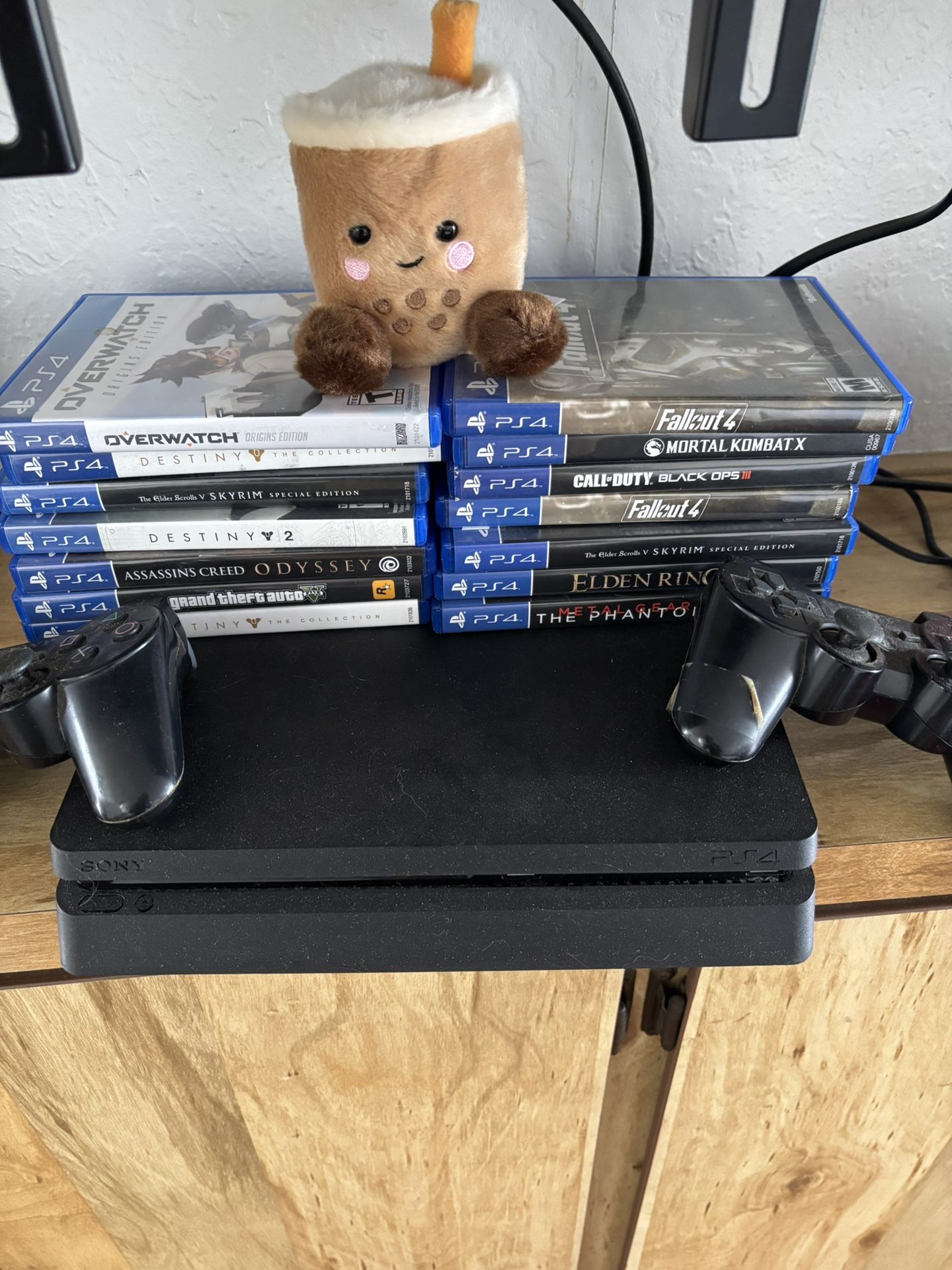 PS4 With Games And Controllers