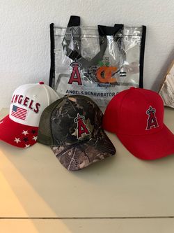 Angels hats. Giveaways at stadium with clear bag. All for $12