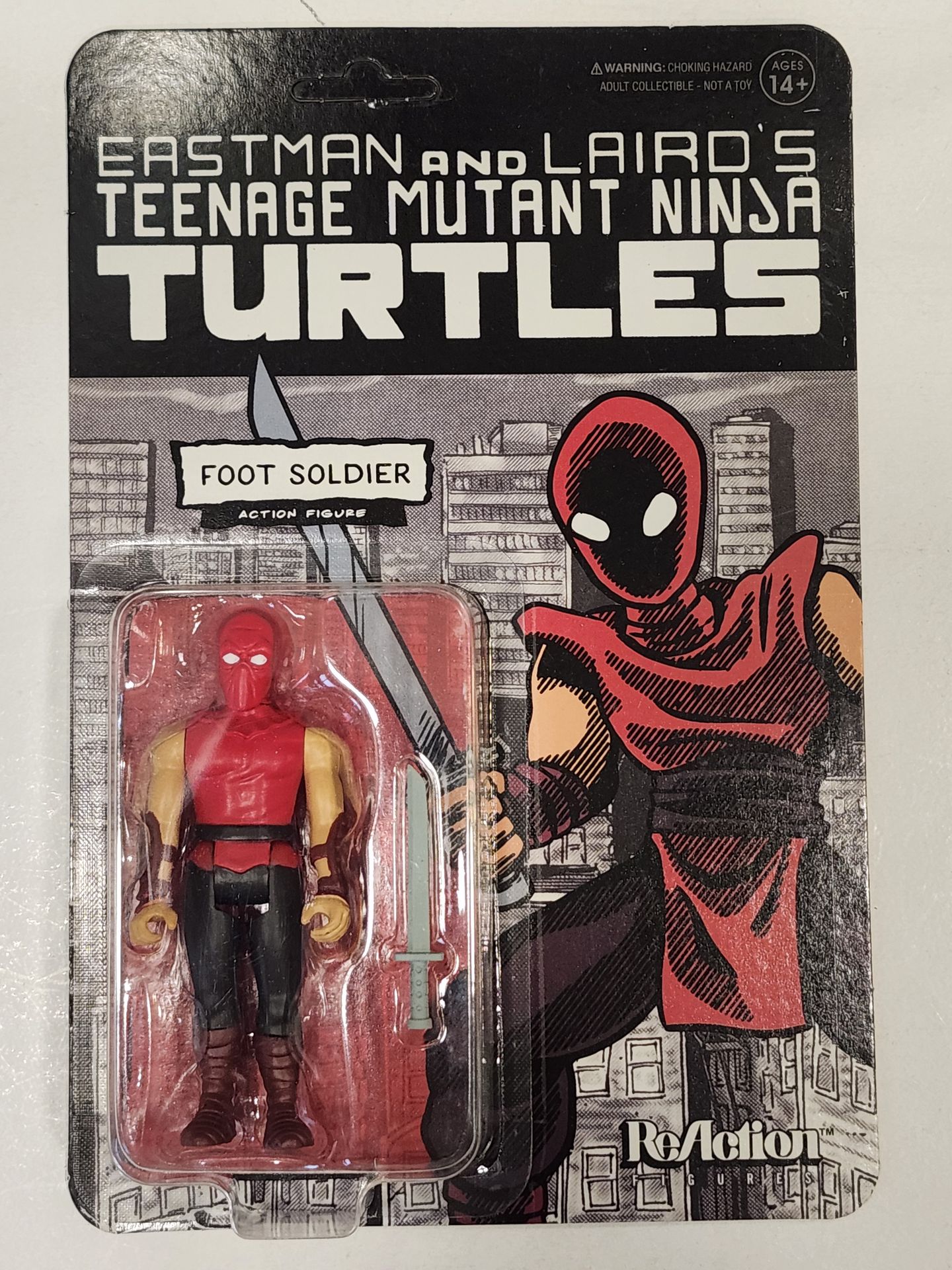 UNPUNCHED CARD. SUPER 7 REACTION FIGURE. EASTMAN AND LAIRDS. TEENAGE MUNTANT NINJA TURTLES. FOOT SOLDIER 3.75 " ACTION FIGURE.