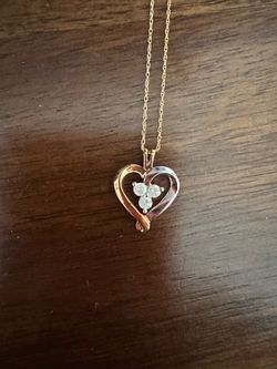 10k gold necklace with diamonds.