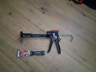 $20 Husky caulking gun & 15 n 1 painter's tool