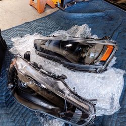 Brand New OEM Evo Headlights