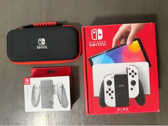 Nintendo Switch oled with joy-con charging grip