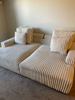 Cream Corduroy Sectional Sofa with Pillows
