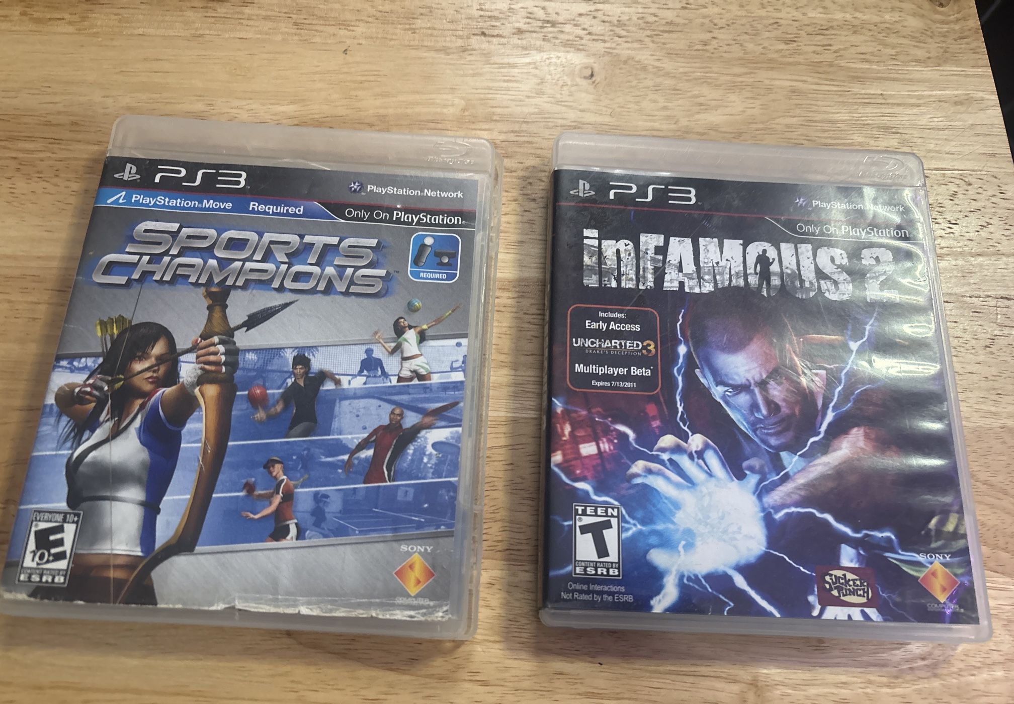 PS3 Game Bundle – inFAMOUS 2 & Sports Champions (Complete Cases)