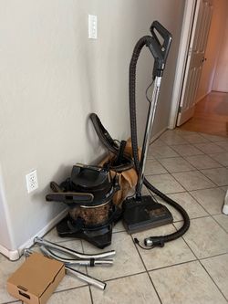 Rainbow vacuum, rug shampoo, water vacuum.