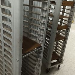 Rubbermaid Polypropylene 18 Slot Trolley with 17 Metal Gastronorm 1/1 Trays to Include: 6 x 100mm (D) & 11 x 40mm (D).