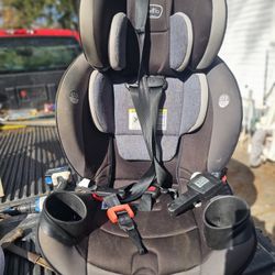 Prices Firm. Front And Rear Facing Children's Car Seat With Quick Attach