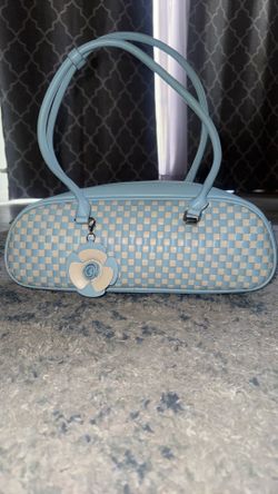 Woven checkered barrel bag