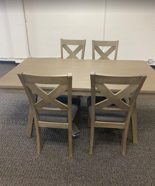 Parellen Dining Table and 4 Chairs$10 Down Payment And Financing Available