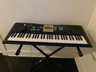 Yamaha Ypt 220 Keyboard With A Stand