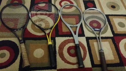 4 used tennis rackets