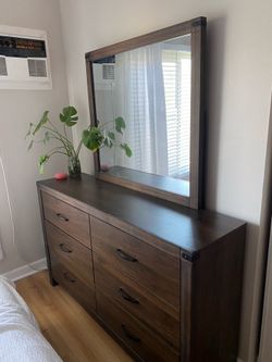 Dark wood dresser and mirror  (Living Spaces)