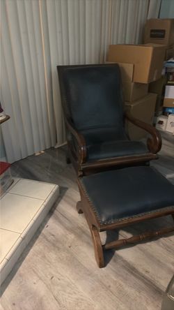 Comfortable wooden leather chair and foot stool