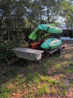 4 kayaks on trailer