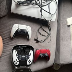 PS5 w/ Controllers and PlayStation Decor 