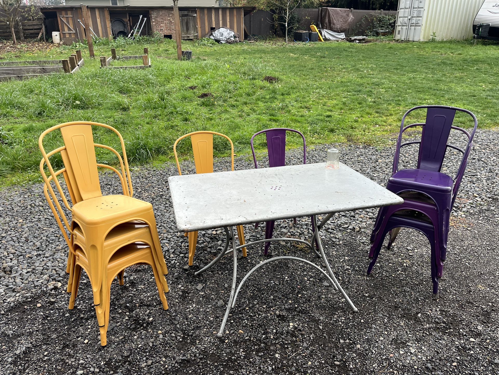 Metal folding table and 8 metal stacking chairs