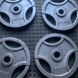 2 Pairs Of 45 Lbs Olympic Weights $70/ Pair