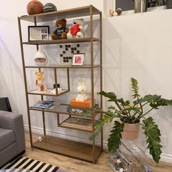 Gold metal and glass shelf with marble inlays