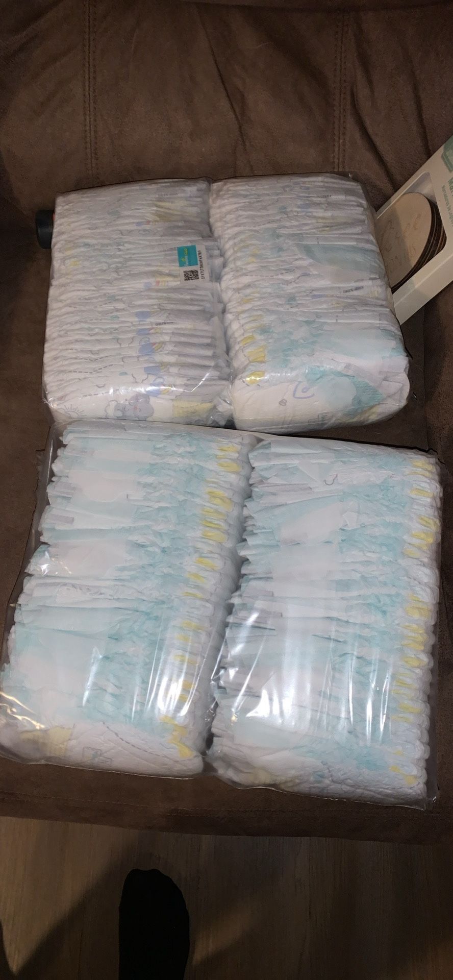 2 Packs Of Newborn Diapers