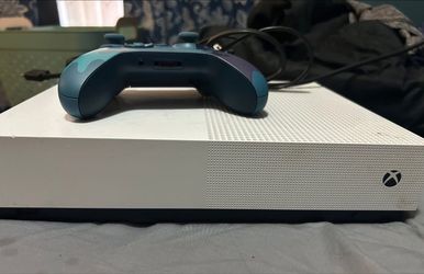 Xbox One S 1TB with a controller