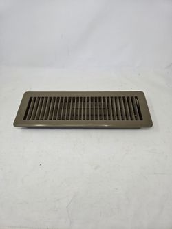 Brown metal floor vent register