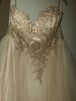 Elegant gold cocktail dress.