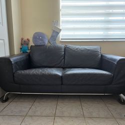 Natuzzi love seat