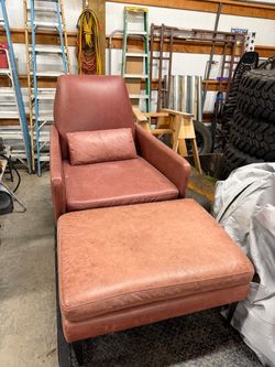 Leather arm chair and ottoman