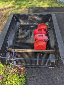 Ford Ranger Bed liner, Front Grill And Gas Cans