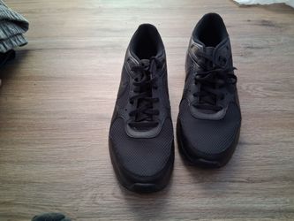 Size 12 Nike Men's Air Max SC sneakers in a triple black colorway.