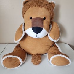 Jay at play Snuggle Pockets Lion. Warm hugs Inside.