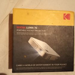 Kodak mini projector perfect New condition goes up to 200 inches in wall more the darker it is it has hdmi for gaming aux for speakers sd card slot US