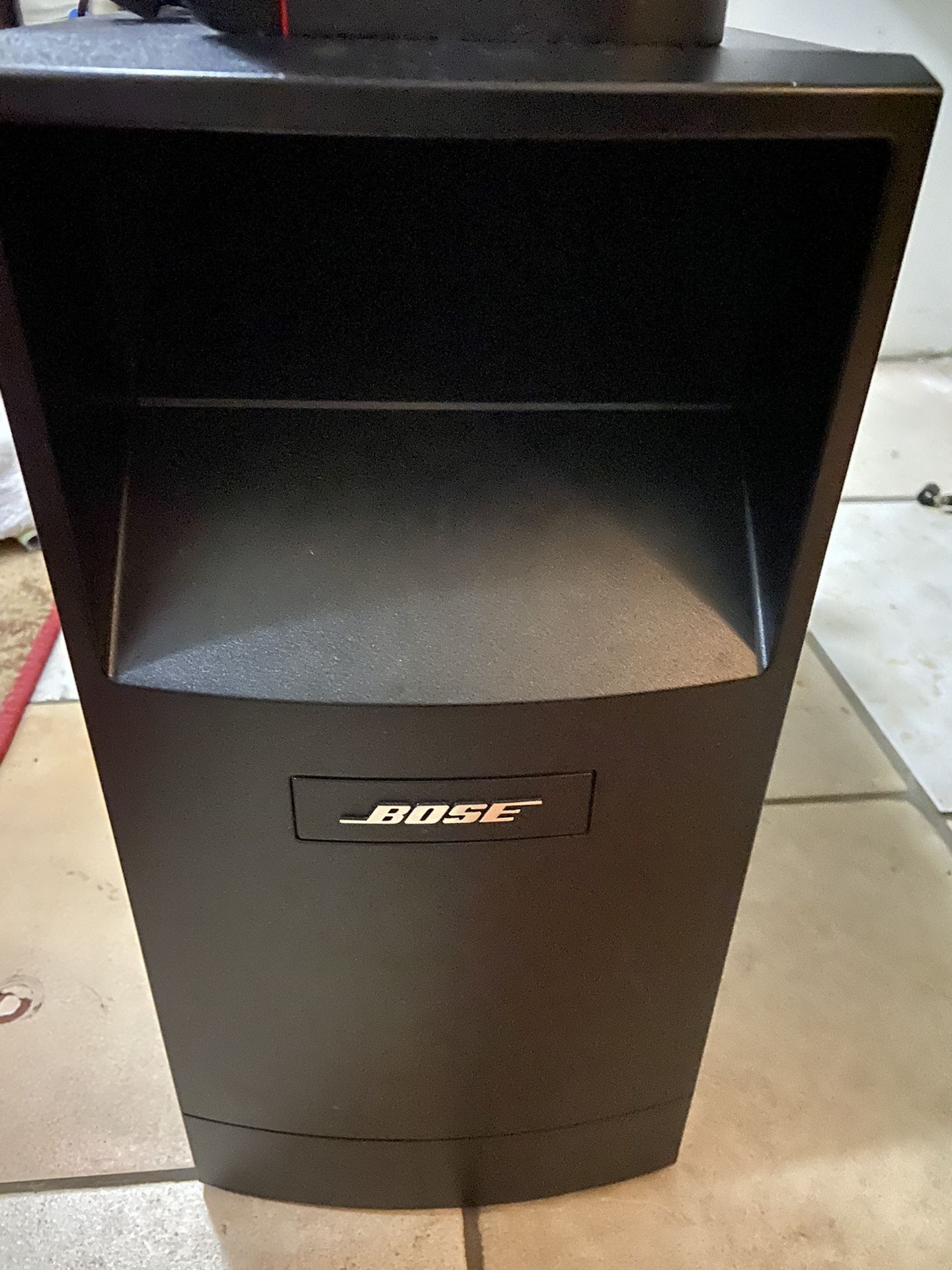 Bose Acoustimas 16 Series ii and 4 Bose Cube Satellite  Speakers. It Comes With Speaker Wires. 