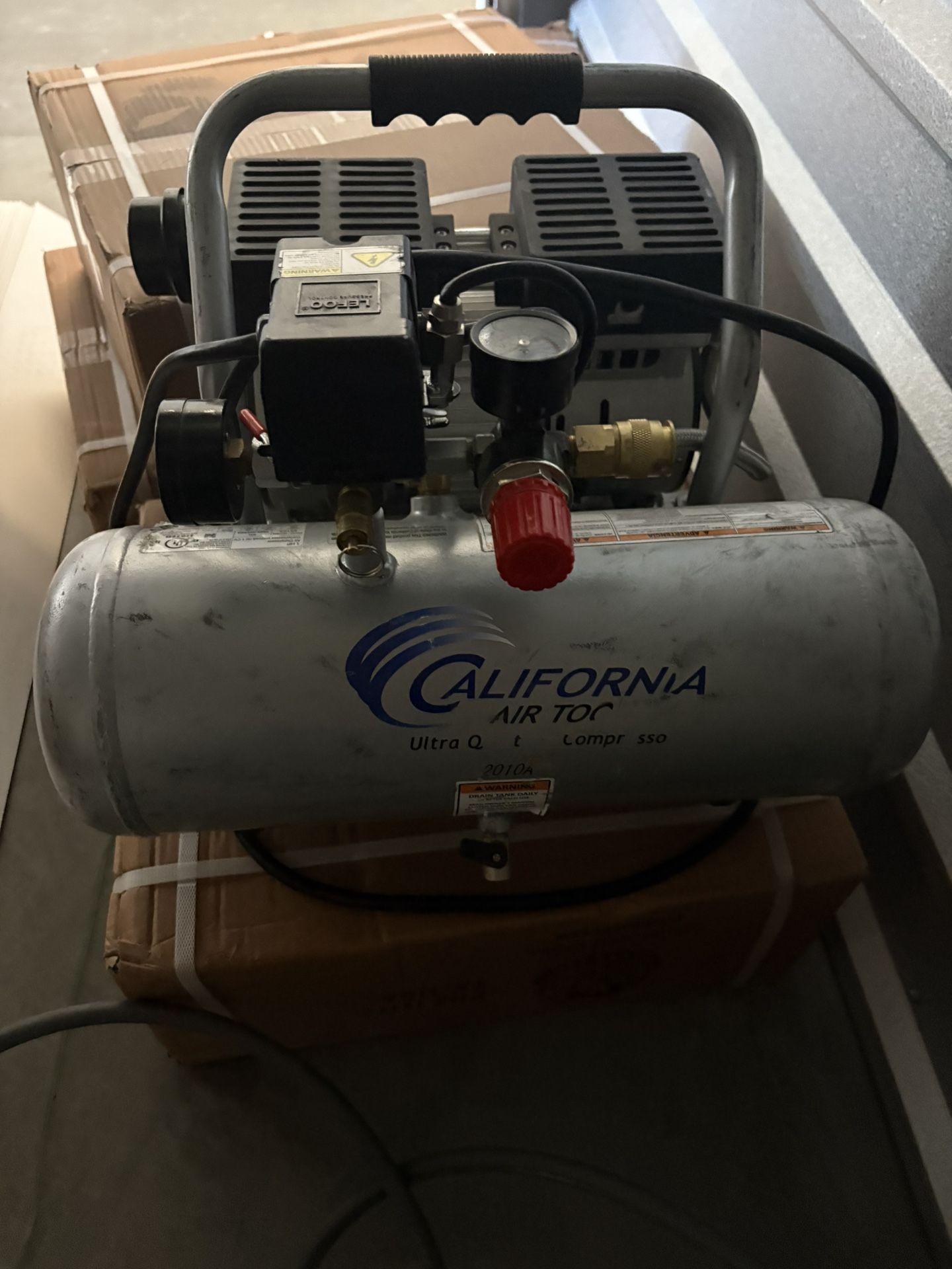 CA Air Compressor,hose, Grex 23 Guage Nail Gun