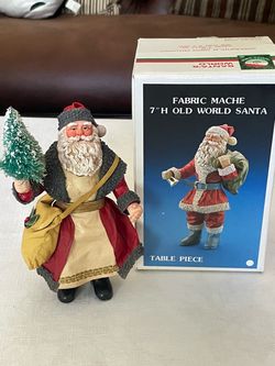 Vintage 7-inch Kurt Adler fabric-mâché Old World Santa figurine with its original box.