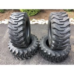 SET of 4 new 12-16.5 Skid steer tires - 12X16.5 HD 12 PLY tires