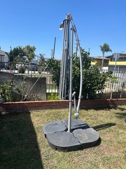 Umbrella base for any size, fills with water, also needs a cover, is in very good condition